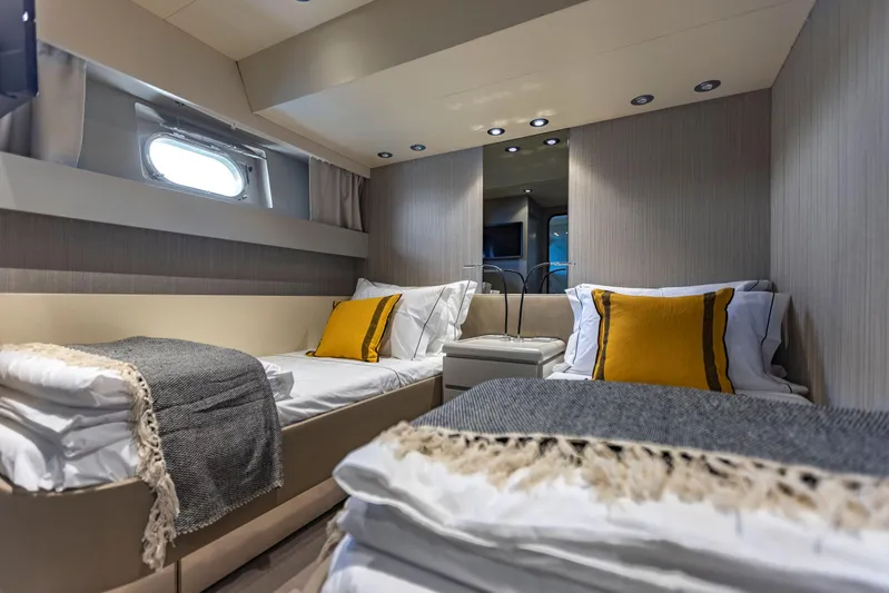  Yacht Photos Pics Luxurious cabin interior of 1987 Versilcraft FALCON 82 yacht with twin beds and elegant decor.