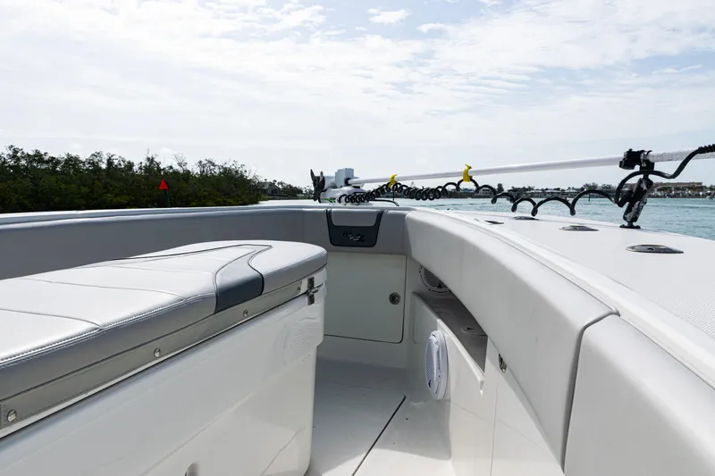  Yacht Photos Pics 2015 SeaVee 390Z boat interior with seating, rod holders, and ocean view.