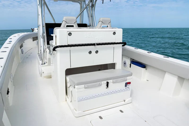  Yacht Photos Pics 2015 SeaVee 390Z boat interior with seating and storage, cruising on open water.