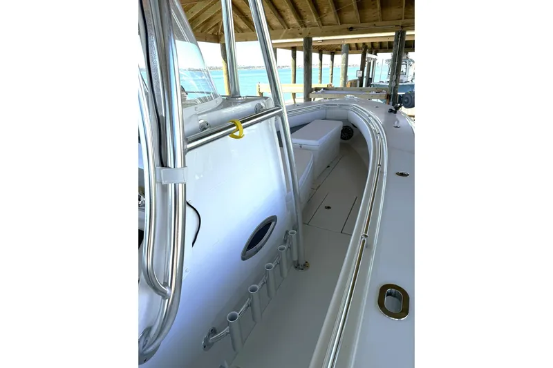  Yacht Photos Pics 2025 Contender 32 ST boat interior with sleek design and rod holders.