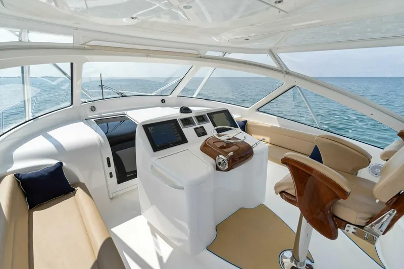 Mahirita Yacht Photos Pics 2014 Viking 42 Open yacht helm station with modern navigation equipment and luxurious seating.