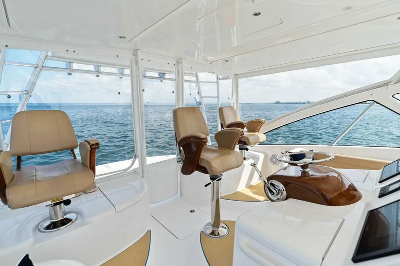 Mahirita Yacht Photos Pics 2014 Viking 42 Open yacht interior with leather seats and ocean view.
