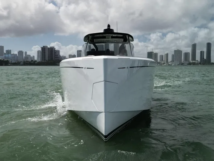 M/y Big Day Yacht Photos Pics Pardo Yachts 38, 2022 model, cruising in urban waters with city skyline backdrop.