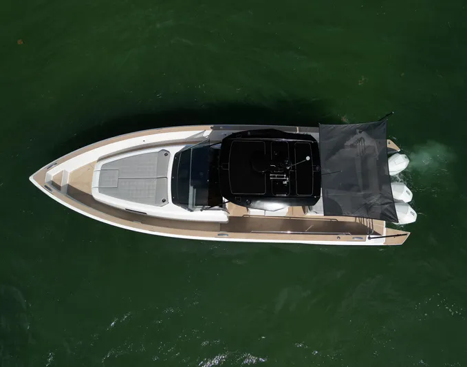 M/y Big Day Yacht Photos Pics Overhead view of 2022 Pardo Yachts 38 on green water.