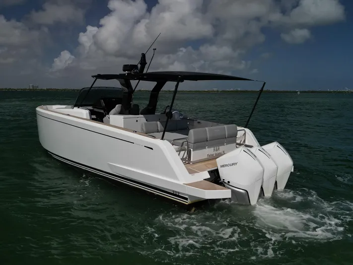 M/y Big Day Yacht Photos Pics 2022 Pardo Yachts 38 cruising on open water under a cloudy sky.