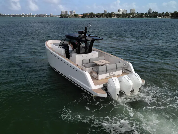 M/y Big Day Yacht Photos Pics 2022 Pardo Yachts 38 cruising on water with triple outboard engines.