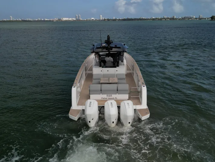 M/y Big Day Yacht Photos Pics 2022 Pardo Yachts 38 cruising on open water with triple outboard engines.