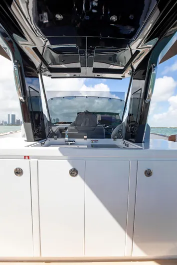 M/y Big Day Yacht Photos Pics 2022 Pardo Yachts 38, sleek design, open deck, modern helm, ocean backdrop.