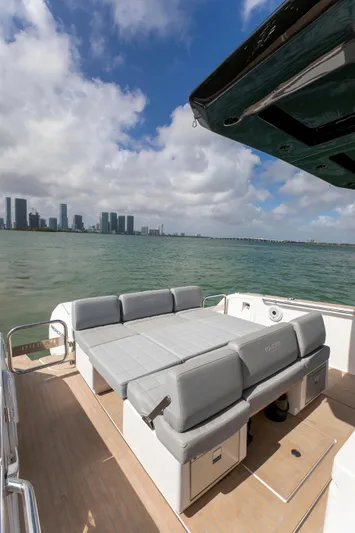 M/y Big Day Yacht Photos Pics 2022 Pardo Yachts 38 with spacious deck, city skyline view, and comfortable seating.