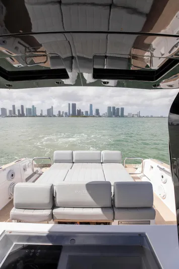 M/y Big Day Yacht Photos Pics 2022 Pardo Yachts 38 with city skyline view, featuring luxurious seating and sleek design.