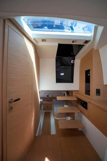 M/y Big Day Yacht Photos Pics Interior of 2022 Pardo Yachts 38, featuring modern wood finishes and skylight.