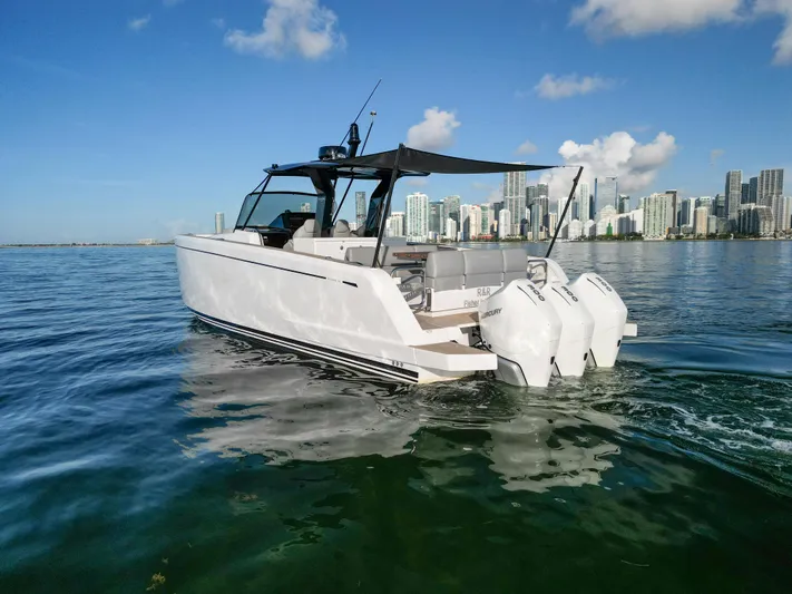 M/y Big Day Yacht Photos Pics 2022 Pardo Yachts 38 cruising on water with city skyline in background.