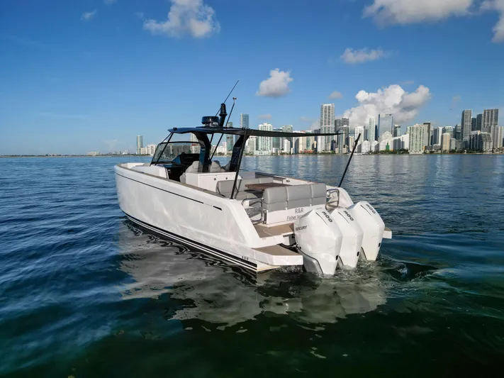 M/y Big Day Yacht Photos Pics 2022 Pardo Yachts 38 cruising near city skyline on a sunny day.