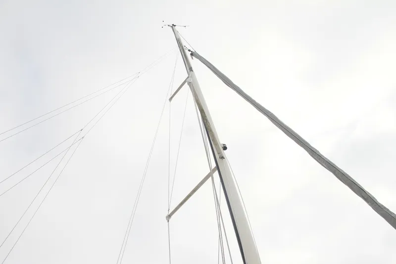 Easterly Yacht Photos Pics Mast of 2009 e Sailing Yachts e33 against cloudy sky.