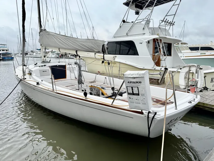 Easterly Yacht Photos Pics 2009 e Sailing Yachts e33 docked at marina, featuring sleek design and white hull.
