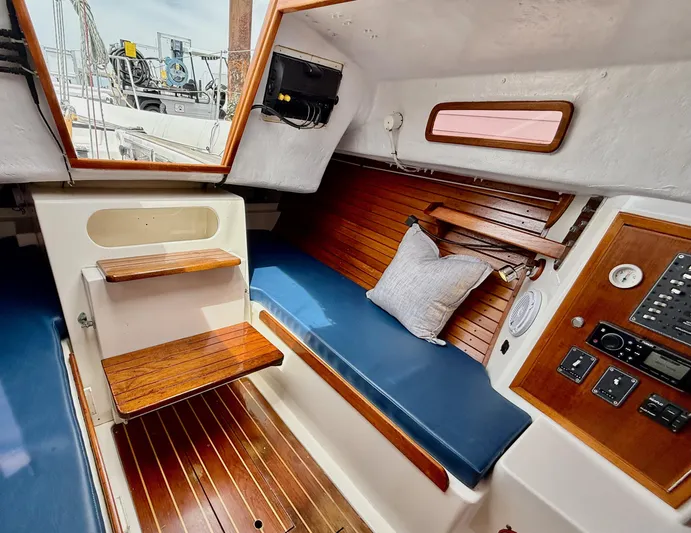 Easterly Yacht Photos Pics 2009 e Sailing Yachts e33 interior with wooden accents and blue seating.