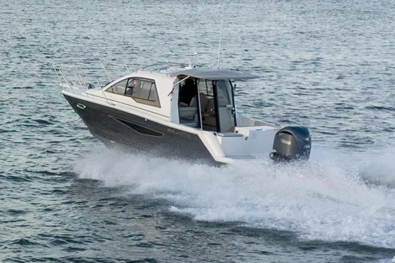  Yacht Photos Pics Manufacturer Provided Image: 2024 Solara S-250 Coupe boat cruising on open water.