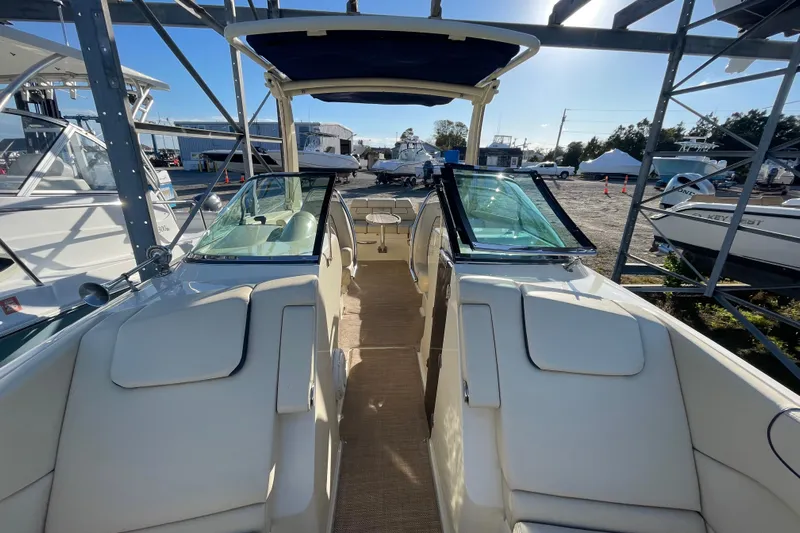  Yacht Photos Pics 2020 Chris-Craft Launch 28 GT boat interior view, showcasing seating and windshield.