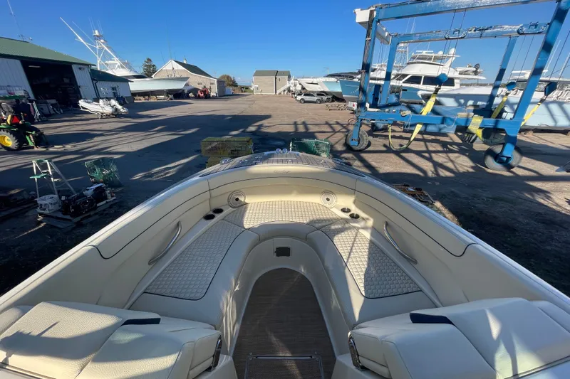  Yacht Photos Pics 2020 Chris-Craft Launch 28 GT boat interior at a marina with equipment.