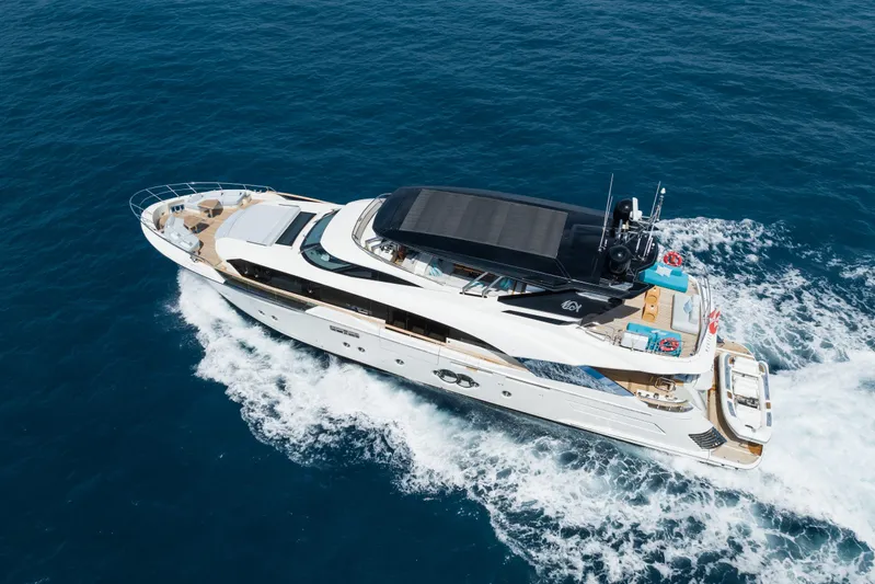 Rocco Yacht Photos Pics 2021 Monte Carlo Yachts MCY 96 cruising on open water.
