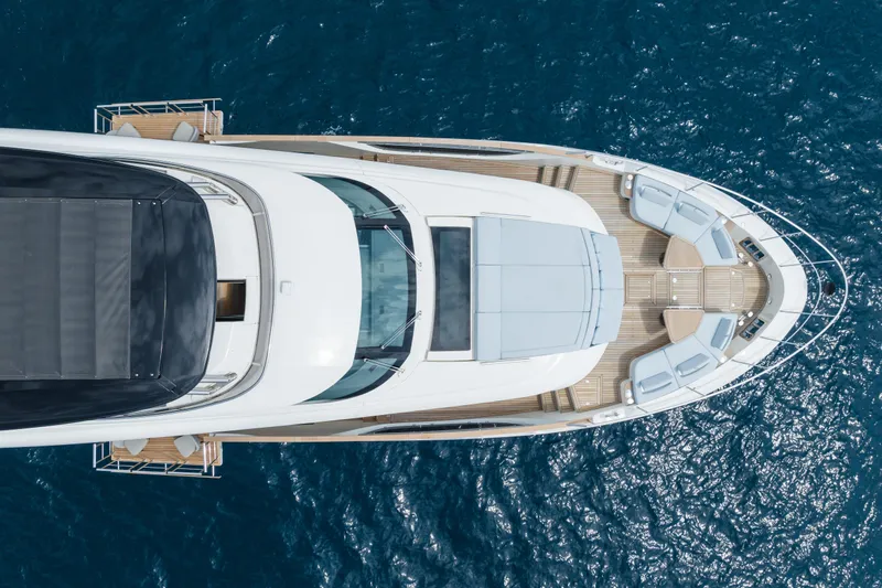 Rocco Yacht Photos Pics Aerial view of 2021 Monte Carlo Yachts MCY 96 luxury yacht on the ocean.
