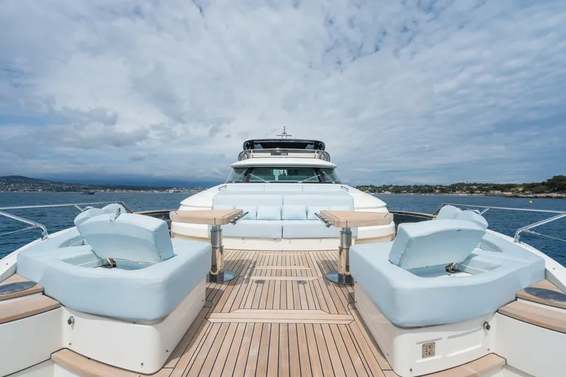 Rocco Yacht Photos Pics 2021 Monte Carlo Yachts MCY 96 deck with luxurious seating and ocean view.