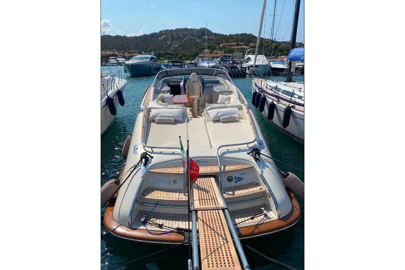  Yacht Photos Pics 2008 Riva RivaRama 44 luxury yacht docked in a marina, featuring elegant design.