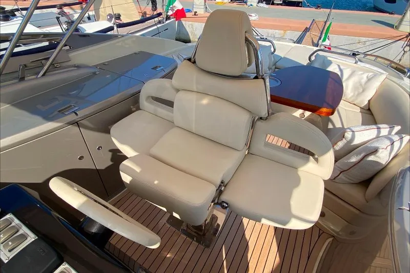  Yacht Photos Pics Luxurious interior of 2008 Riva RivaRama 44 yacht with plush seating and wooden accents.