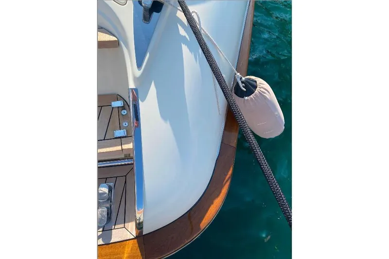  Yacht Photos Pics Close-up of 2008 Riva RivaRama 44 yacht deck with fender and rope.