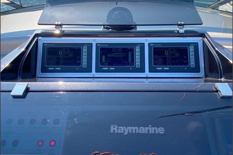  Yacht Photos Pics Dashboard of 2008 Riva RivaRama 44 with Raymarine navigation displays.