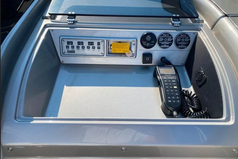  Yacht Photos Pics Control panel of a 2008 Riva RivaRama 44 boat with gauges and communication device.