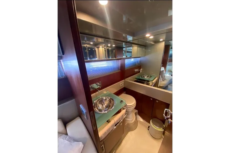  Yacht Photos Pics Luxurious bathroom interior of 2008 Riva RivaRama 44 yacht with modern fixtures.