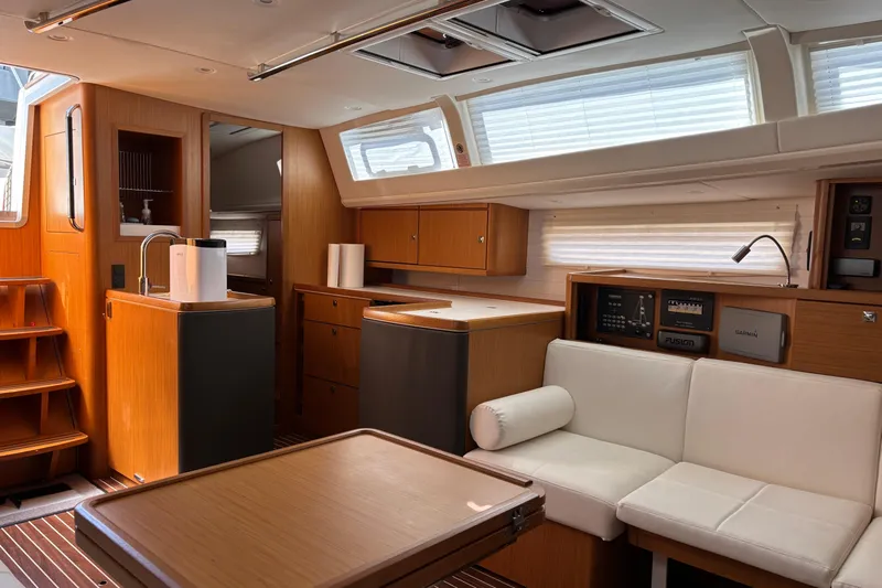  Yacht Photos Pics Luxurious interior of 2014 Bavaria Vision 46 yacht with modern kitchen and seating area.