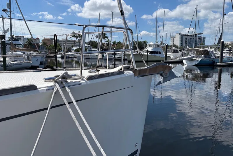  Yacht Photos Pics 2014 Bavaria Vision 46 yacht docked in a marina under a clear blue sky.