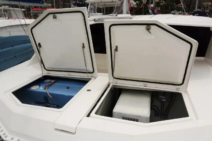 Zumbrota Yacht Photos Pics Open storage compartments on a 2014 Leopard 48 catamaran deck.