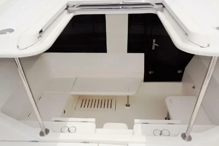 2014 Leopard 48 yacht interior with sleek white seating and modern design.