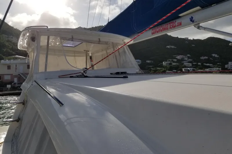 Zumbrota Yacht Photos Pics 2014 Leopard 48 yacht docked with scenic hillside view in the background.