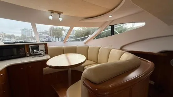 Dazilus Yacht Photos Pics Interior of 2001 Silverton 410 Sport Bridge yacht with cozy seating and modern amenities.