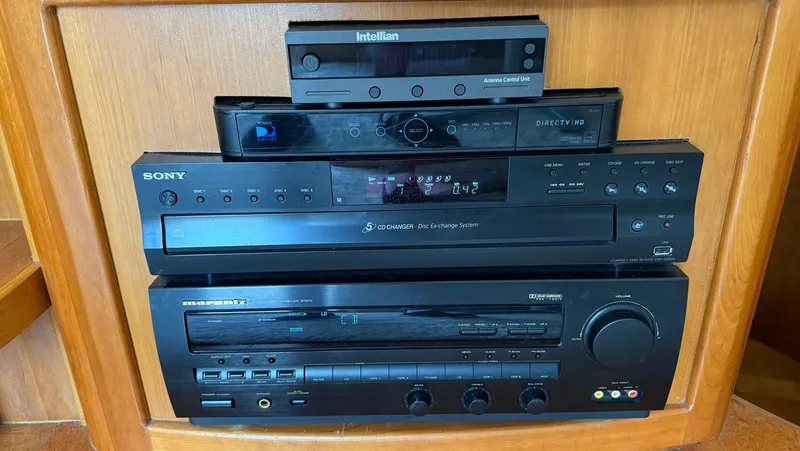 Dazilus Yacht Photos Pics Stacked audio and video equipment in a 2001 Silverton 410 Sport Bridge yacht.