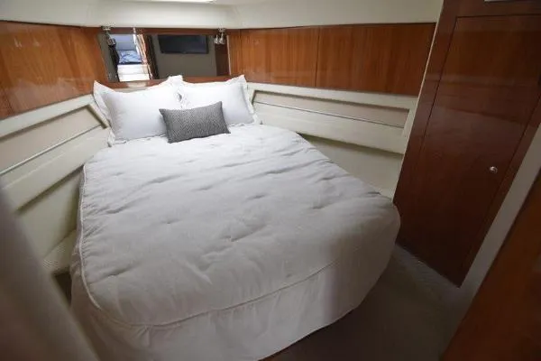 No Contingencies Yacht Photos Pics Luxurious bedroom interior of 2012 Riviera 440 Sport Yacht with cozy bedding.