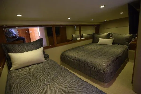 No Contingencies Yacht Photos Pics Interior of 2012 Riviera 440 Sport Yacht with twin beds and modern decor.