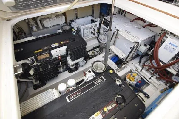 No Contingencies Yacht Photos Pics Engine room of 2012 Riviera 440 Sport Yacht with visible machinery and components.