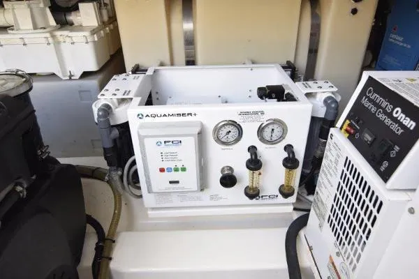No Contingencies Yacht Photos Pics Riviera 440 Sport Yacht 2012 engine room with Aquamiser+ and Cummins Onan marine generator.