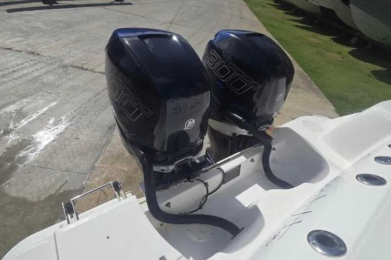  Yacht Photos Pics Twin Mercury Racing 300 engines on a 2013 Boston Whaler 320 Outrage boat.