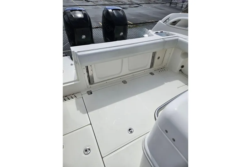  Yacht Photos Pics 2013 Boston Whaler 320 Outrage boat deck with dual outboard engines.