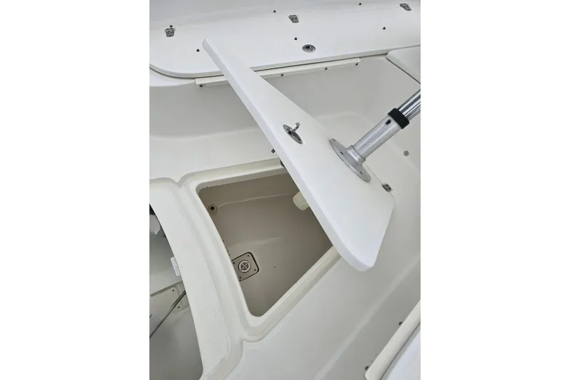  Yacht Photos Pics 2013 Boston Whaler 320 Outrage storage compartment with open hatch.