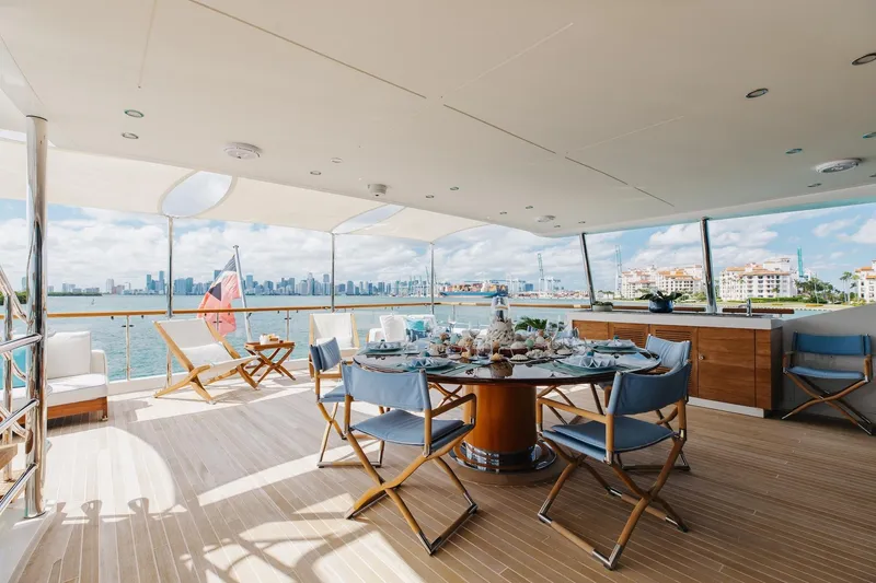 Inspiration Yacht Photos Pics Luxurious 2018 Benetti Fast 125 yacht deck with elegant dining setup and stunning waterfront views.