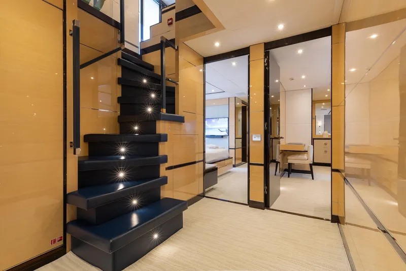 Inspiration Yacht Photos Pics Luxurious interior of 2018 Benetti Fast 125 yacht with modern staircase and elegant design.