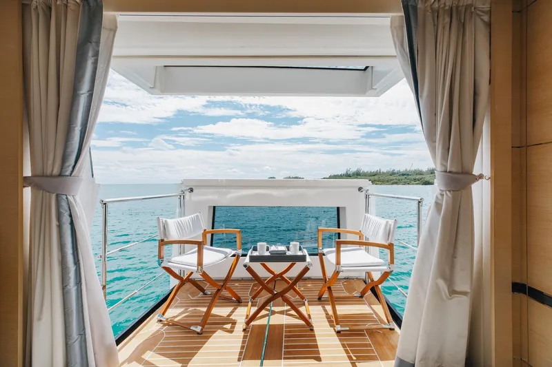 Inspiration Yacht Photos Pics Luxurious Benetti Fast 125 yacht deck with ocean view, featuring elegant seating, 2018 model.