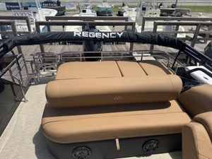 2024 Regency 250 LE3 Sport boat with tan seating and sleek design.